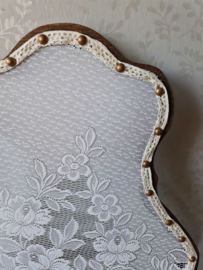 Oude kleine raamhor bloemen