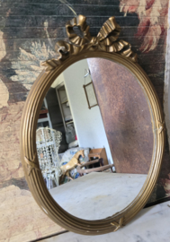 Oude houten strikspiegel