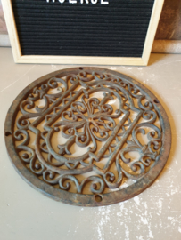 Rond gietijzeren ornament