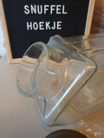 Oude liggende glazen snoeppot