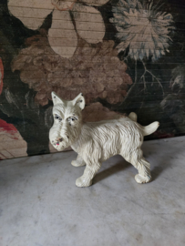 Wit gietijzeren deurstopper terrier hond