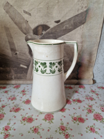 Oude beboterde kan art deco