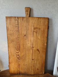 Oud doorleefd houten kaasplank serveerplank