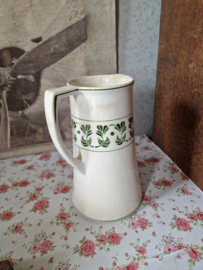 Oude beboterde kan art deco