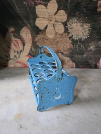 Oud blauw blikken eierrekje