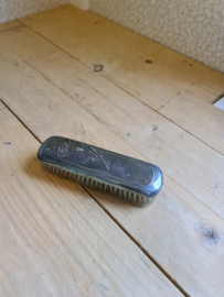 Oude verzilverde borstel gero