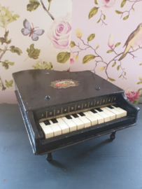 Zwart houten baby piano