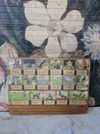 Oud leesplankje aap noot mies