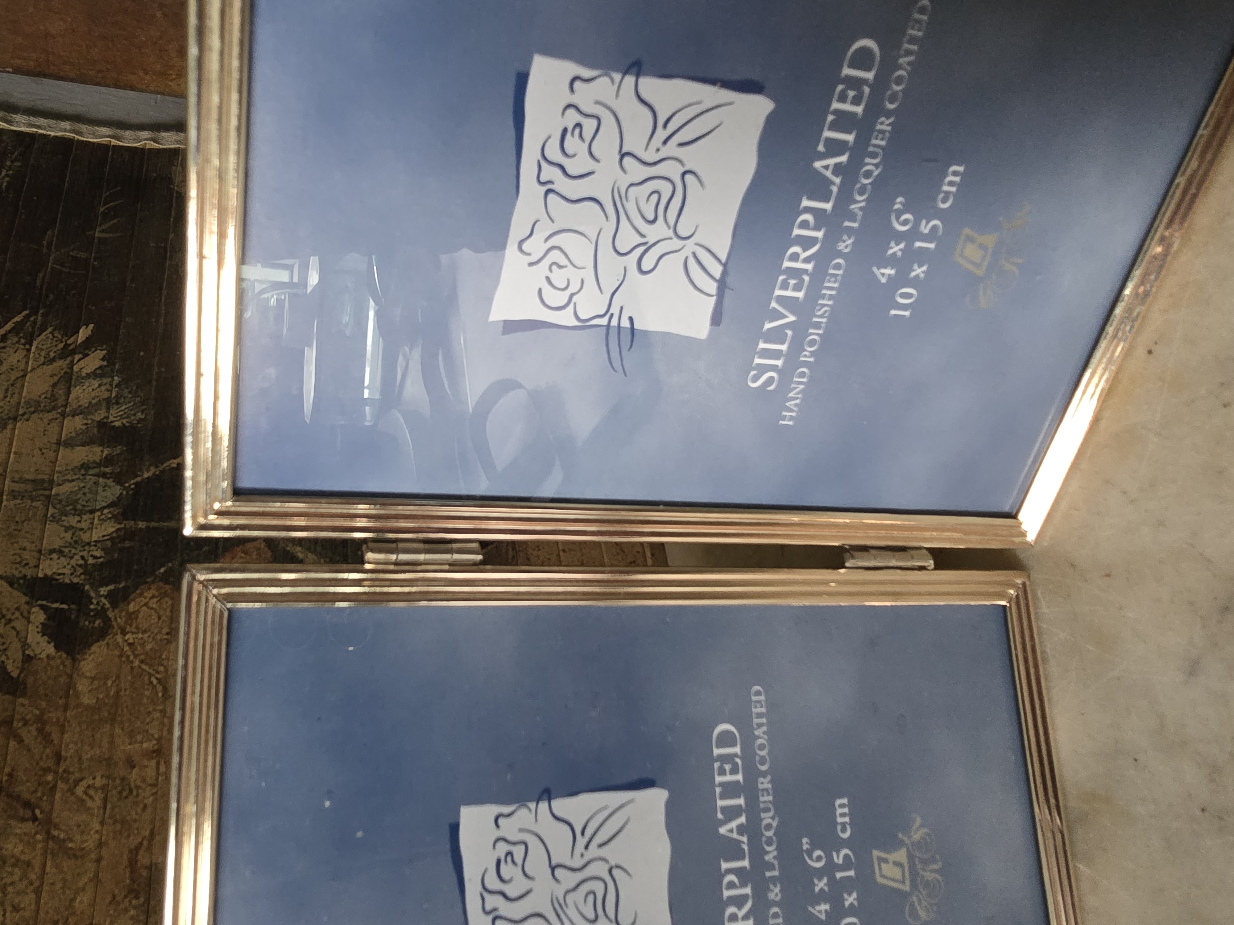 Verzilverde fotolijst drieluik
