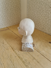 Oud poppen hoofdje pierrot
