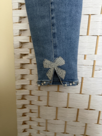 Skinny jeans met pareltjes