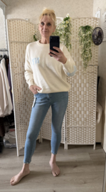 Skinny jeans met pareltjes