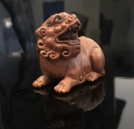 Netsuke "Sishi leeuwtjes" buxushout