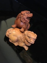 Netsuke "Sishi leeuwtjes" buxushout