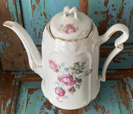 Oude Franse pot met rozen