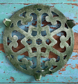 Groene gietijzeren onderzetter