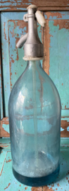Blauwe spuitwaterfles