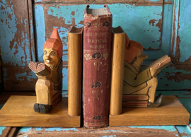 Oude houten boekensteunen