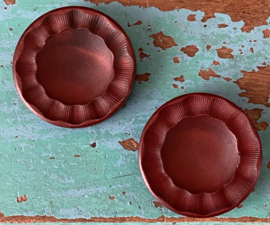 Grote bordeauxrode knopen