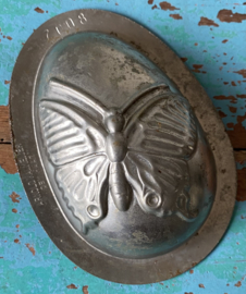 Paaseivorm met vlinder