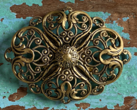 Opengewerkte broche