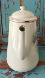 Oude emaille pot met viooltjes