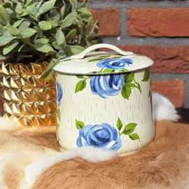 Vintage blik met blauwe rozen