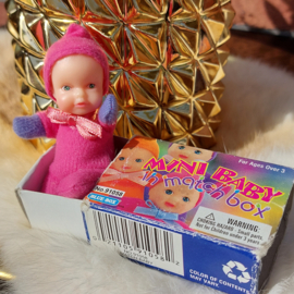 Vintage Mini baby in matchbox/Mini dolls /Lucifer"popje, roze, 70's