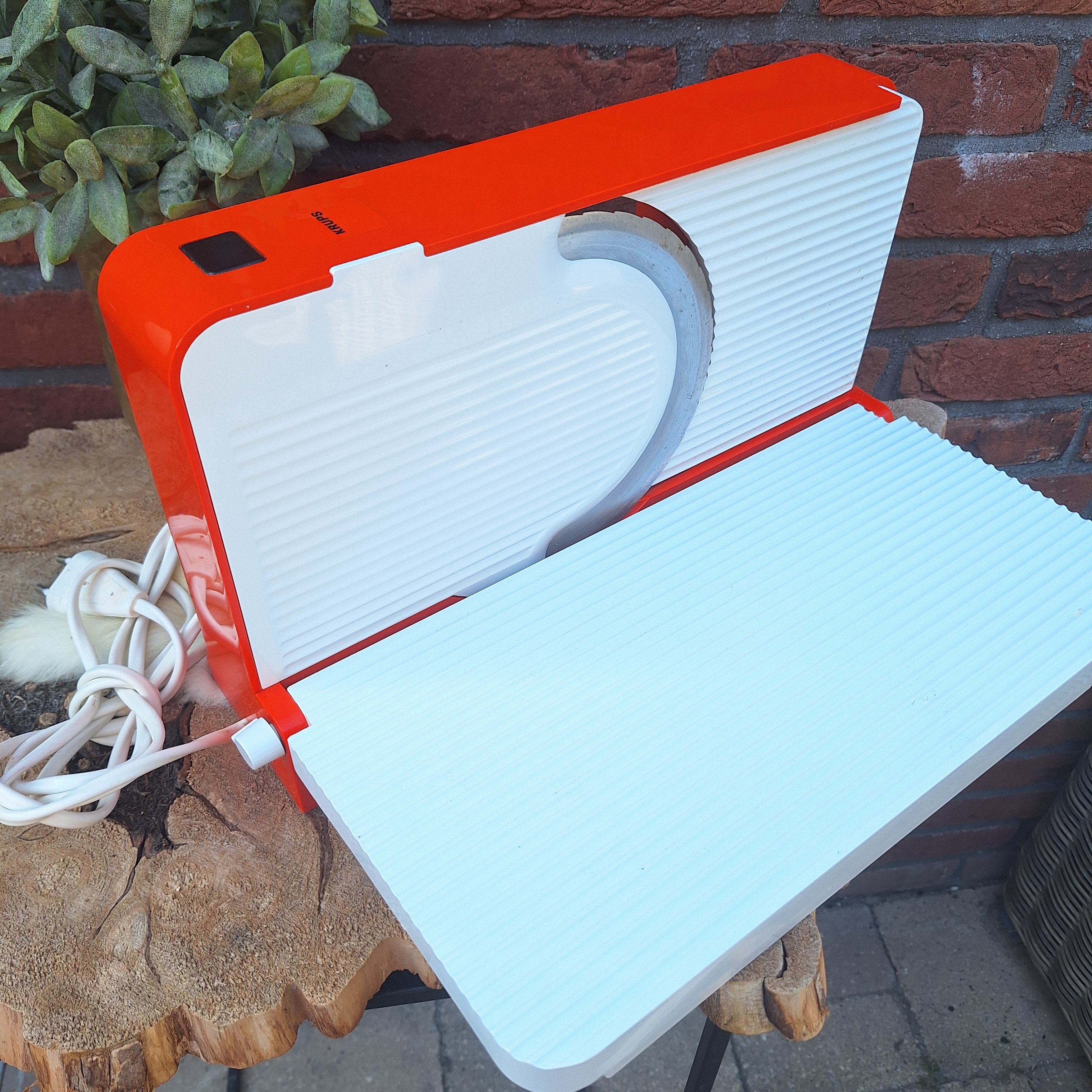 Vintage Krups snijmachine in oranje/wit