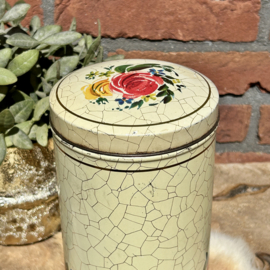 Vintage beschuit blik met bloemen op craquelé achtergrond, Verkade