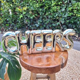 Te huur:   Letters "Cheers" in kunststof goud