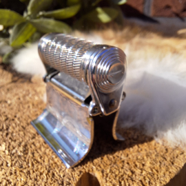 Vintage 'Rally Razer';  een opvouwbaar scheer gadget