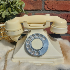 Vintage ivoorkleurige bakelieten telefoon