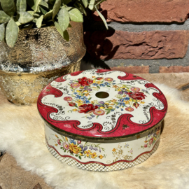 Vintage blik 'golven' in rood en bloemendecor