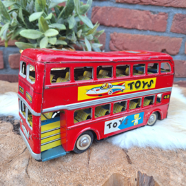 Vintage blikken Engelse 'friction' dubbeldekker bus, 1960