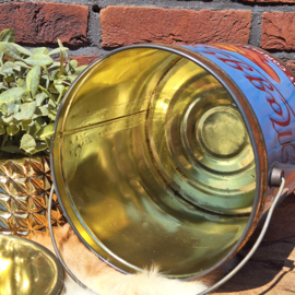 Vintage blik rond van Maggi met Frans decor