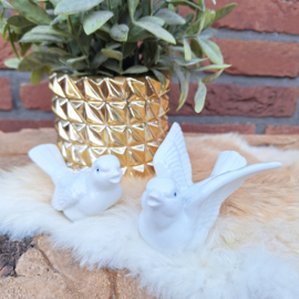 2 vintage beeldjes  'wit vogeltje', porselein