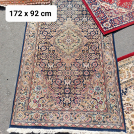 Te huur: Perzisch tapijt blauw 172 x 92 cm.