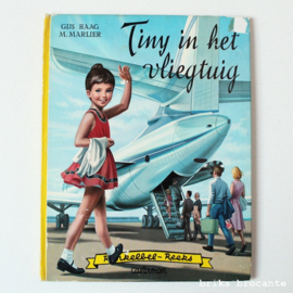 Tiny in het vliegtuig