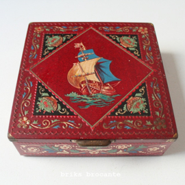 blik met zeilschip