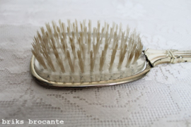 zilverkleurige haarborstel