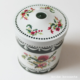 blikje  roomwit-groen met bloemen