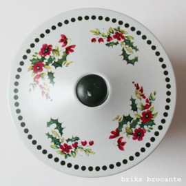 blikje  roomwit-groen met bloemen