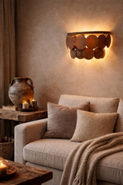 Wandlamp met roestige schijven