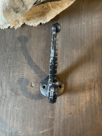 Zwarte ijzeren kapstok haak