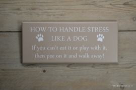 Tekstbord How to handle stress like a dog..