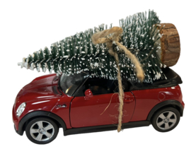 Auto met kerstboom; Mini Cooper