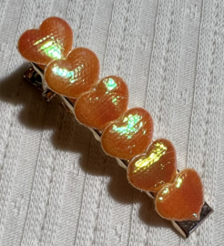 Alligator clip goud 45 mm met 6 oranje hartjes