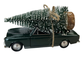 Auto met kerstboom; Peugeot