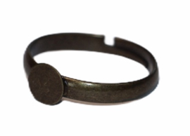 Verstelbare (kinder) ring ca 16 mm bronskleur met plakvlak 5 mm